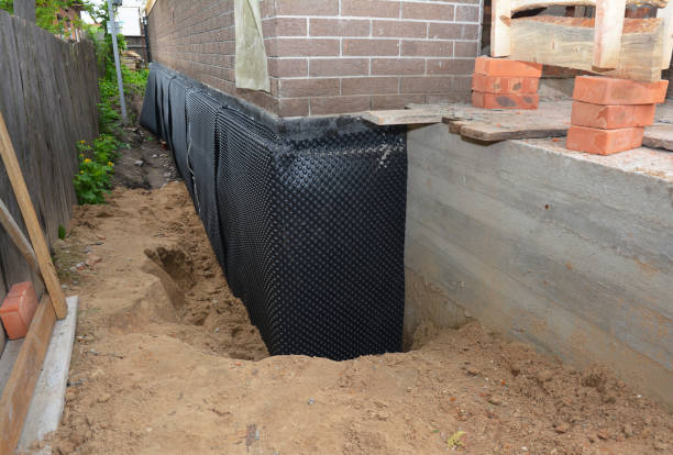 Happy homeowners after waterproofing job in Brightwood